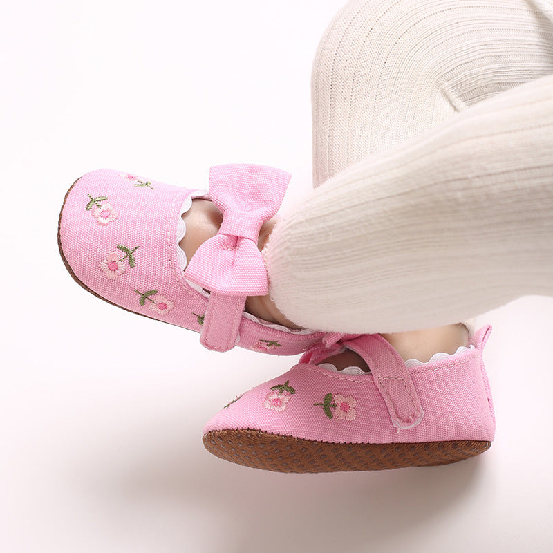 Children's Shoes with Little Flowers and a Small Bow