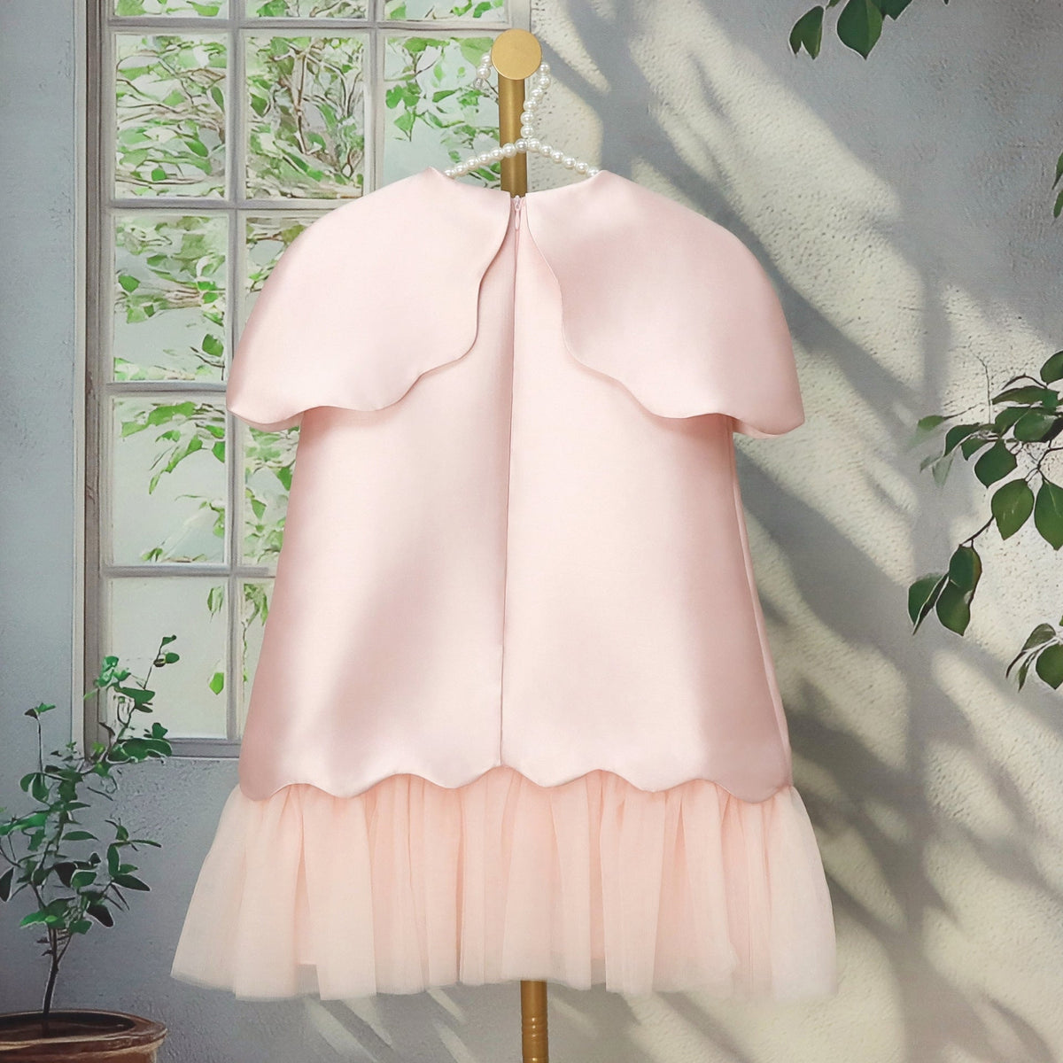 Floral dress for girls with tulle trim.
