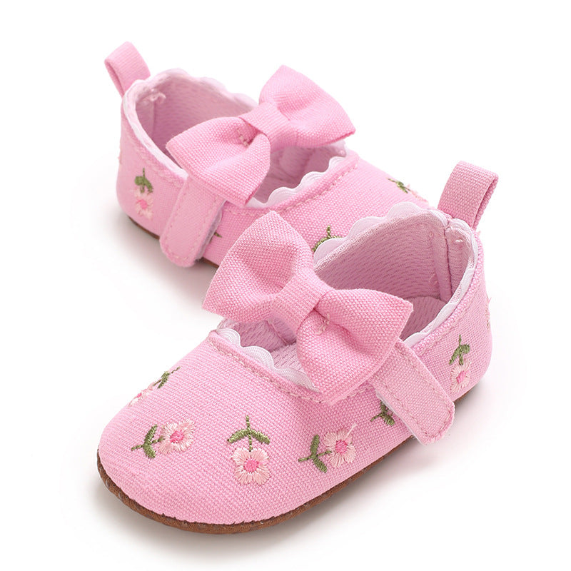 Children's Shoes with Little Flowers and a Small Bow