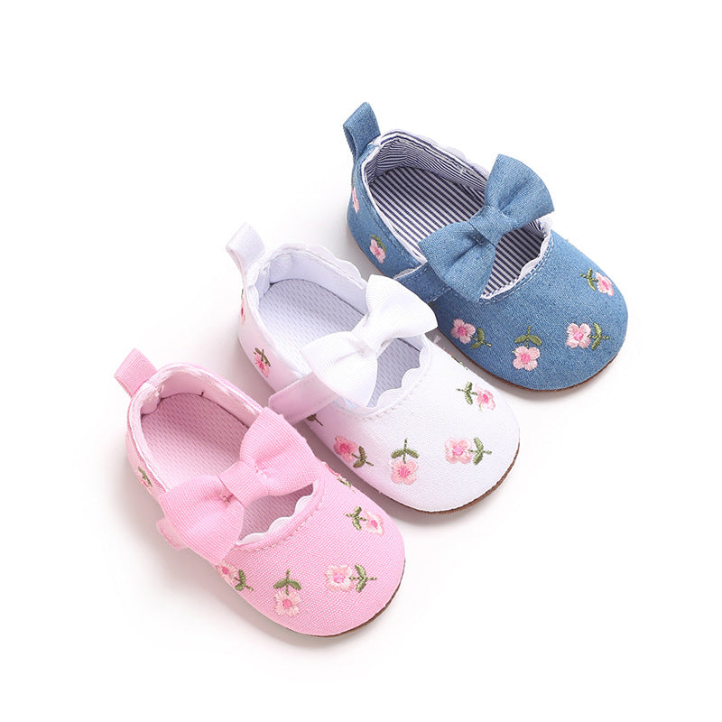 Children's Shoes with Little Flowers and a Small Bow