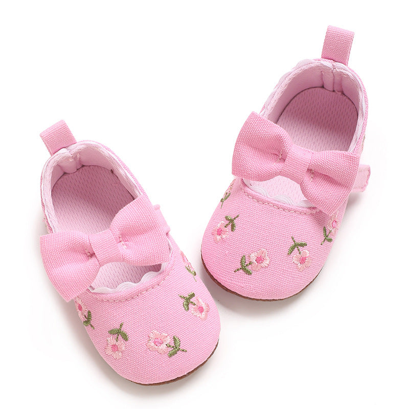 Children's Shoes with Little Flowers and a Small Bow