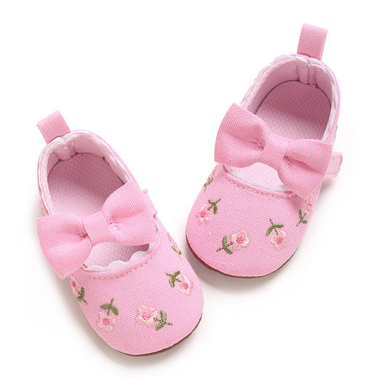 Children's Shoes with Little Flowers and a Small Bow