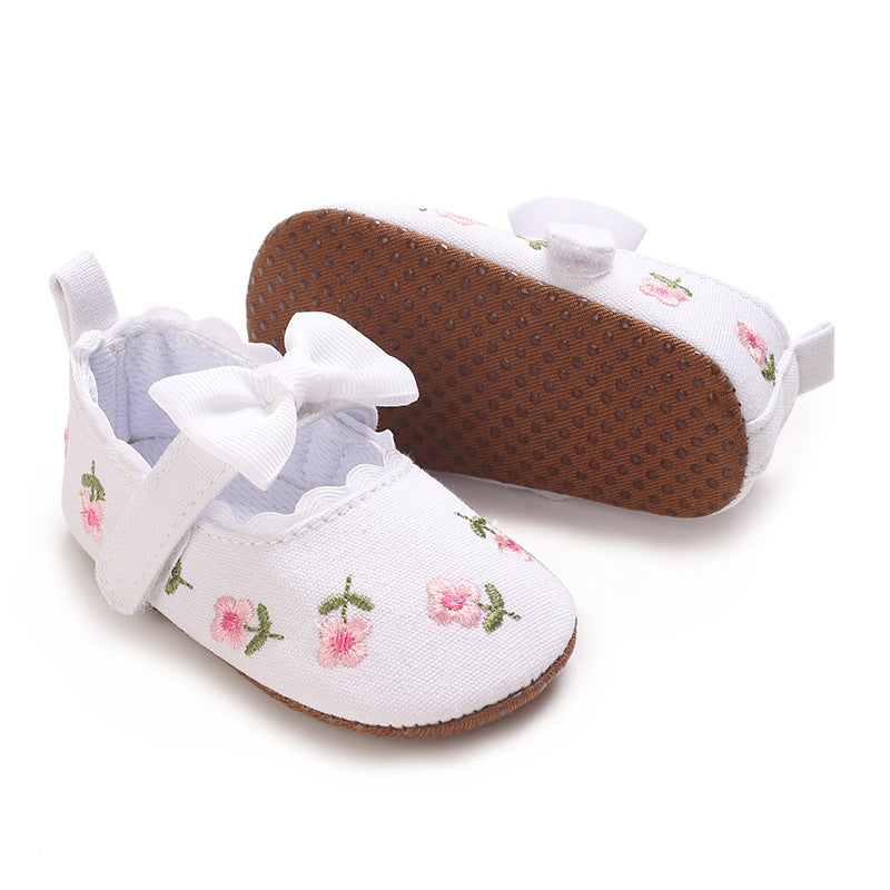 Children's Shoes with Little Flowers and a Small Bow