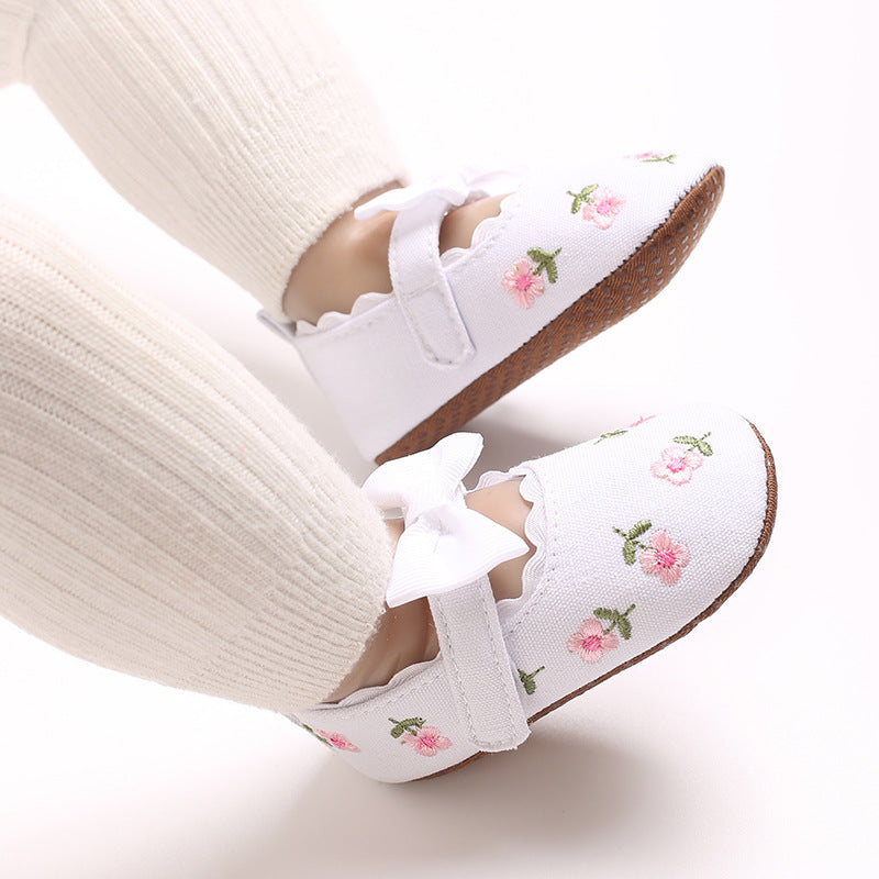 Children's Shoes with Little Flowers and a Small Bow
