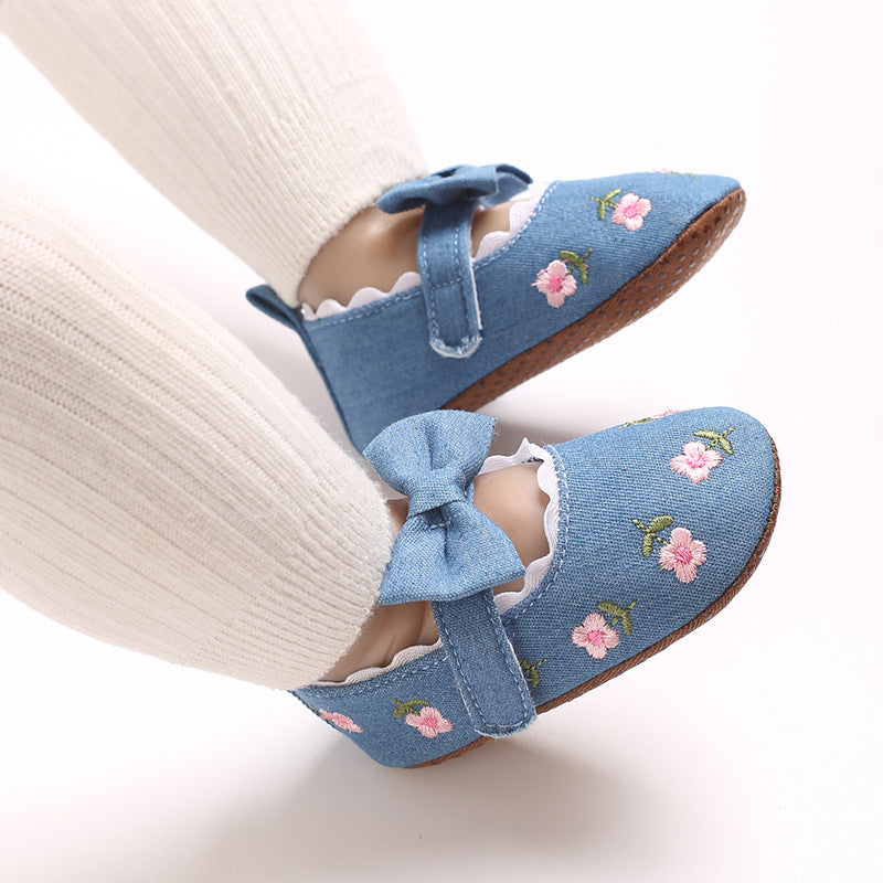 Children's Shoes with Little Flowers and a Small Bow