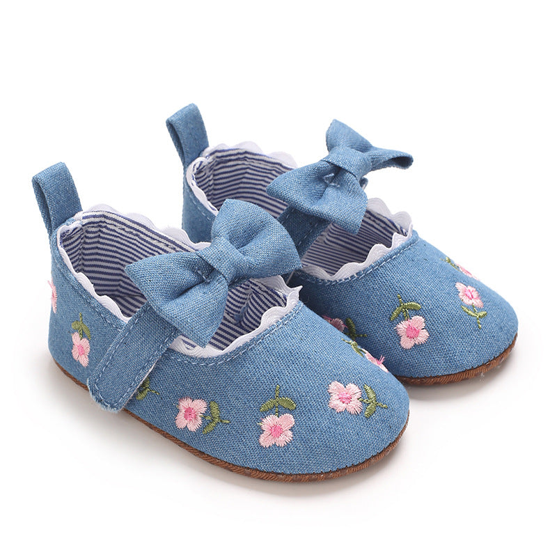 Children's Shoes with Little Flowers and a Small Bow
