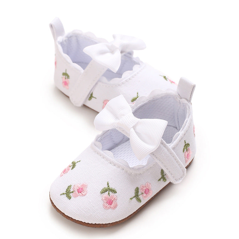 Children's Shoes with Little Flowers and a Small Bow
