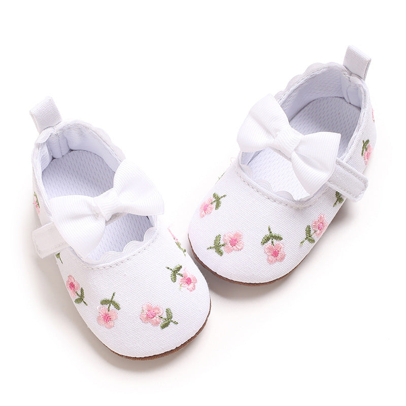 Children's Shoes with Little Flowers and a Small Bow