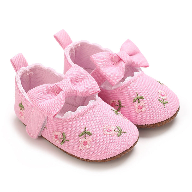 Children's Shoes with Little Flowers and a Small Bow